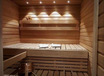 Фото номера Шале с 3 спальнями Шале Hideaway Cottage г. Ивало 15