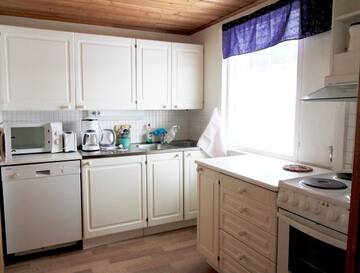 Фото номера Шале с 3 спальнями Шале Hideaway Cottage г. Ивало 9