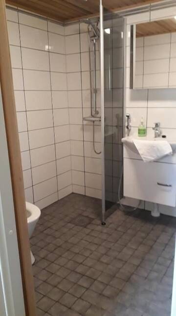 Фото номера Шале с 3 спальнями Шале Hideaway Cottage г. Ивало 35