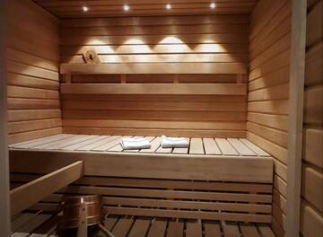 Фото номера Шале с 3 спальнями Шале Hideaway Cottage г. Ивало 40