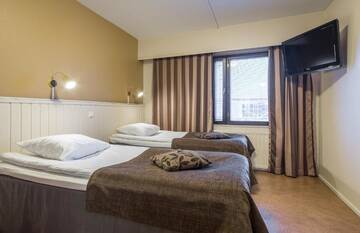Фото номера Двухместный номер с 2 отдельными кроватями Отель Kultahippu Hotel &amp; Apartments г. Ивало 6