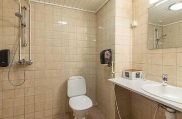 Фото номера Двухместный номер с 2 отдельными кроватями и сауной Отель Kultahippu Hotel &amp; Apartments г. Ивало 4