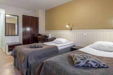 Фото номера Двухместный номер с 2 отдельными кроватями Отель Kultahippu Hotel &amp; Apartments г. Ивало 4
