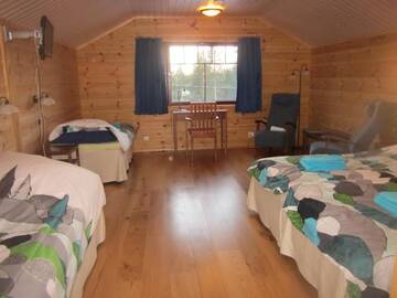Фото номера Четырехместный номер Гостевой дом Guesthouse Husky г. Ивало 3