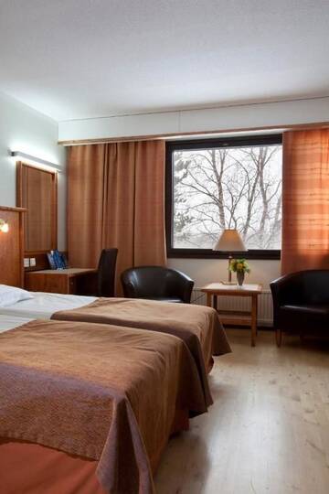 Фото номера Стандартный двухместный номер с 2 отдельными кроватями Отель Hotel Ivalo г. Ивало 3