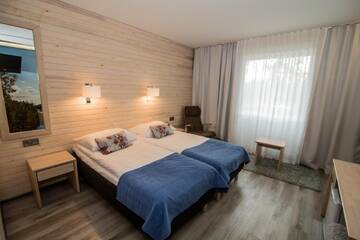 Фото номера Двухместный номер «Премиум» с 2 отдельными кроватями Отель Hotel Ivalo г. Ивало 2