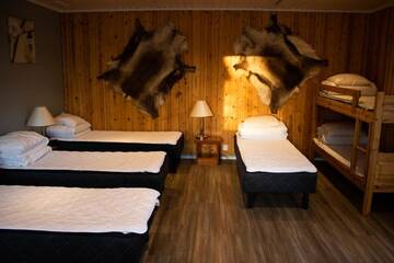Фото номера Апартаменты с общей ванной комнатой Кемпинги Ivalo River Camping г. Ивало 3