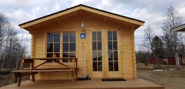 Фото номера Небольшой коттедж с общей ванной комнатой Курортные отели Näverniemi Holiday Center г. Ивало 10