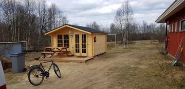 Фото номера Небольшой коттедж с общей ванной комнатой Курортные отели Näverniemi Holiday Center г. Ивало 11