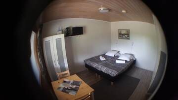 Фото номера Двухместный номер с 2 отдельными кроватями Курортные отели Näverniemi Holiday Center г. Ивало 3