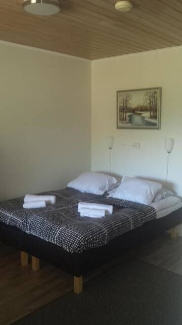 Фото номера Двухместный номер с 2 отдельными кроватями Курортные отели Näverniemi Holiday Center г. Ивало 4