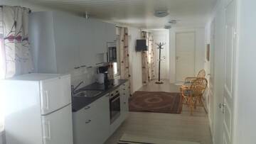 Фото номера Коттедж с 3 спальнями Курортные отели Näverniemi Holiday Center г. Ивало 5