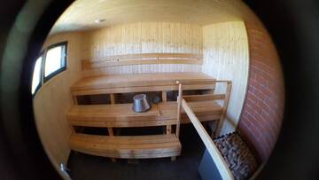 Фото номера Небольшой коттедж с общей ванной комнатой Курортные отели Näverniemi Holiday Center г. Ивало 17