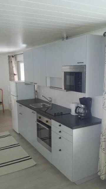 Фото номера Коттедж с 3 спальнями Курортные отели Näverniemi Holiday Center г. Ивало 3