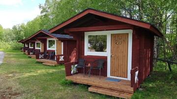 Фото номера Небольшой коттедж с общей ванной комнатой Курортные отели Näverniemi Holiday Center г. Ивало 3