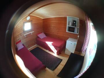 Фото номера Небольшой коттедж с общей ванной комнатой Курортные отели Näverniemi Holiday Center г. Ивало 4
